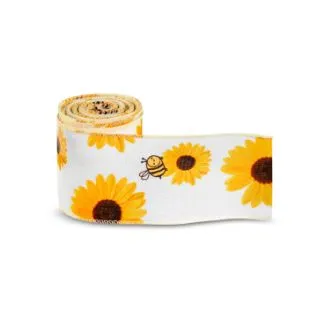 Gavebånd af store blomster med sød bi.