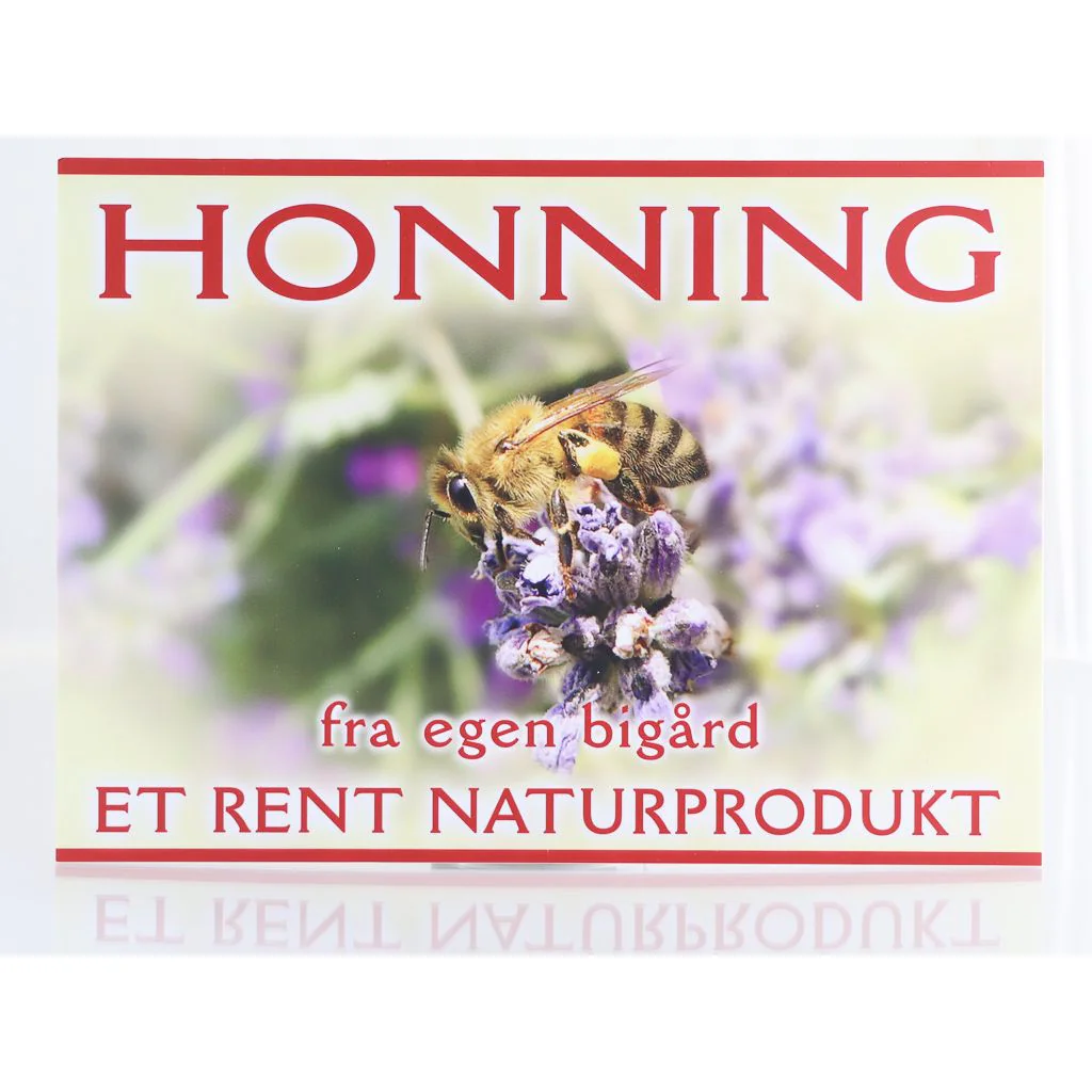 Bi i lilla blomster. Honning fra egen bigård - Et rent naturprodukt