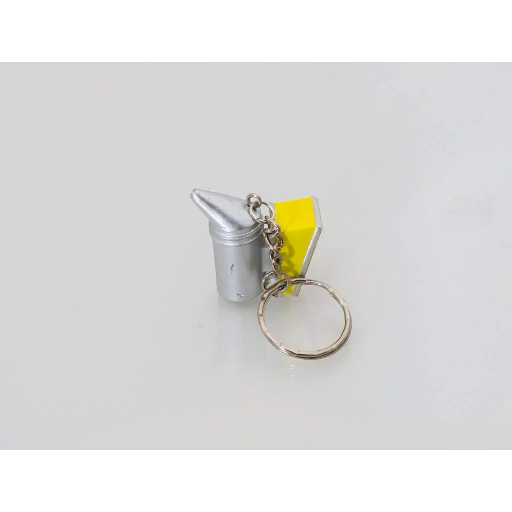 Lille nøglering med røgpuster